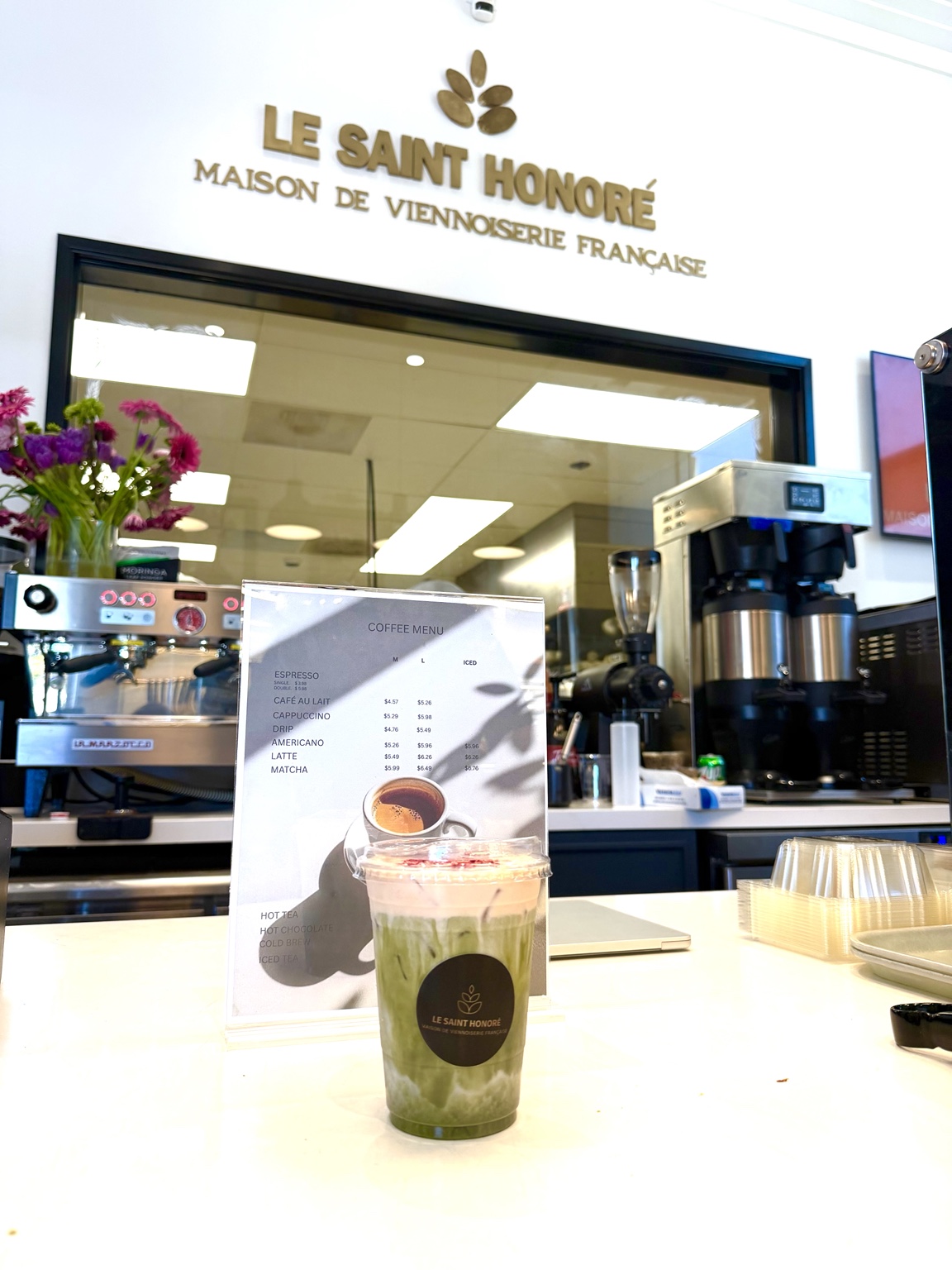A matcha drink at the Le Saint Honoré Irvine counter