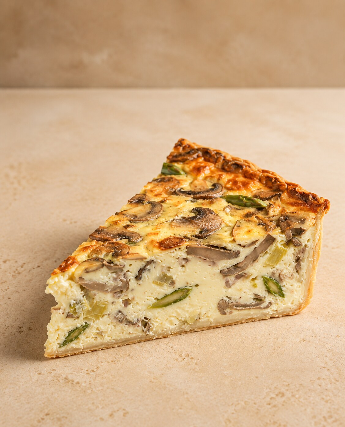 Mushroom, asparagus and leek quiche slice