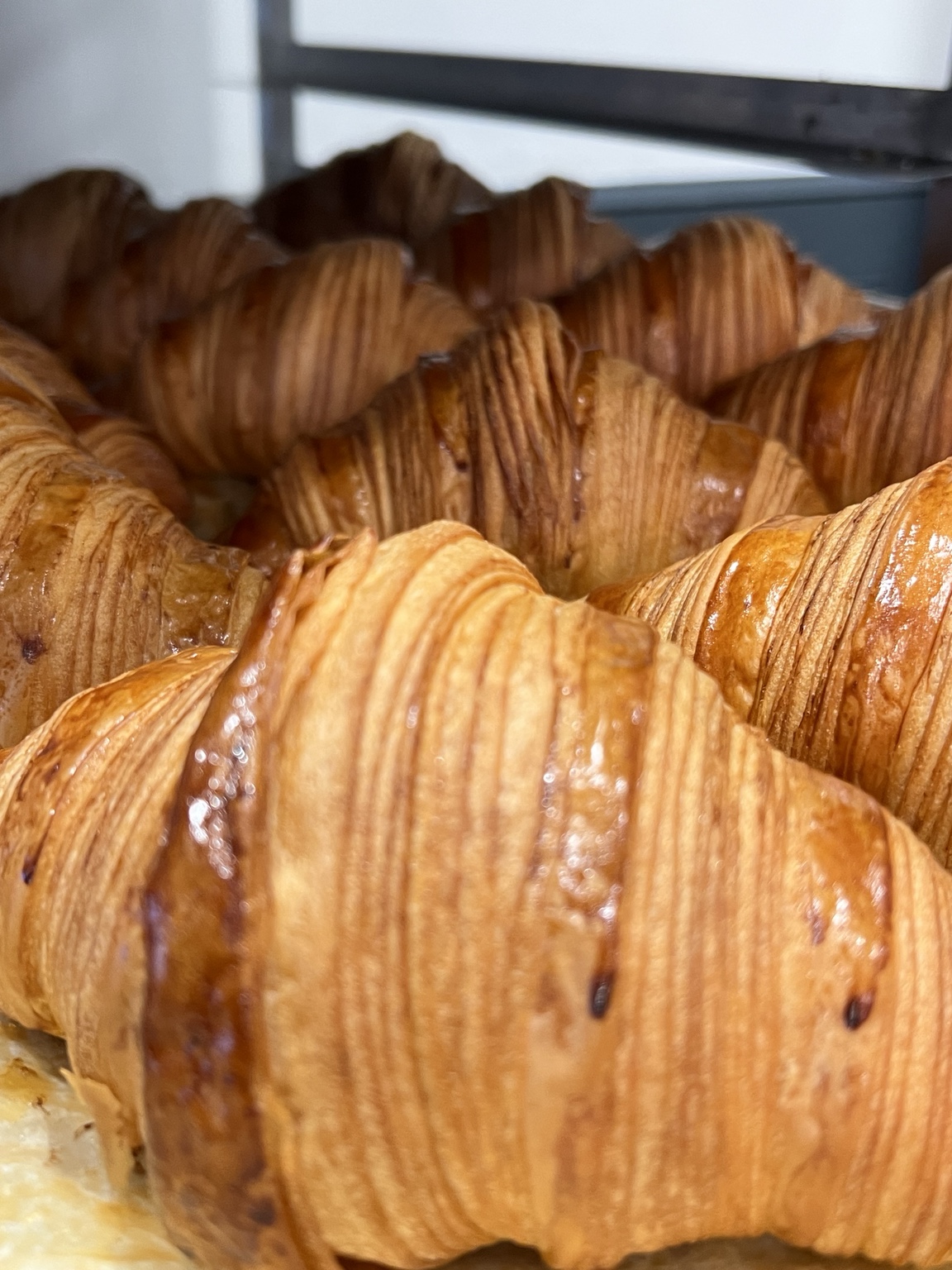 Freshly baked golden croissants